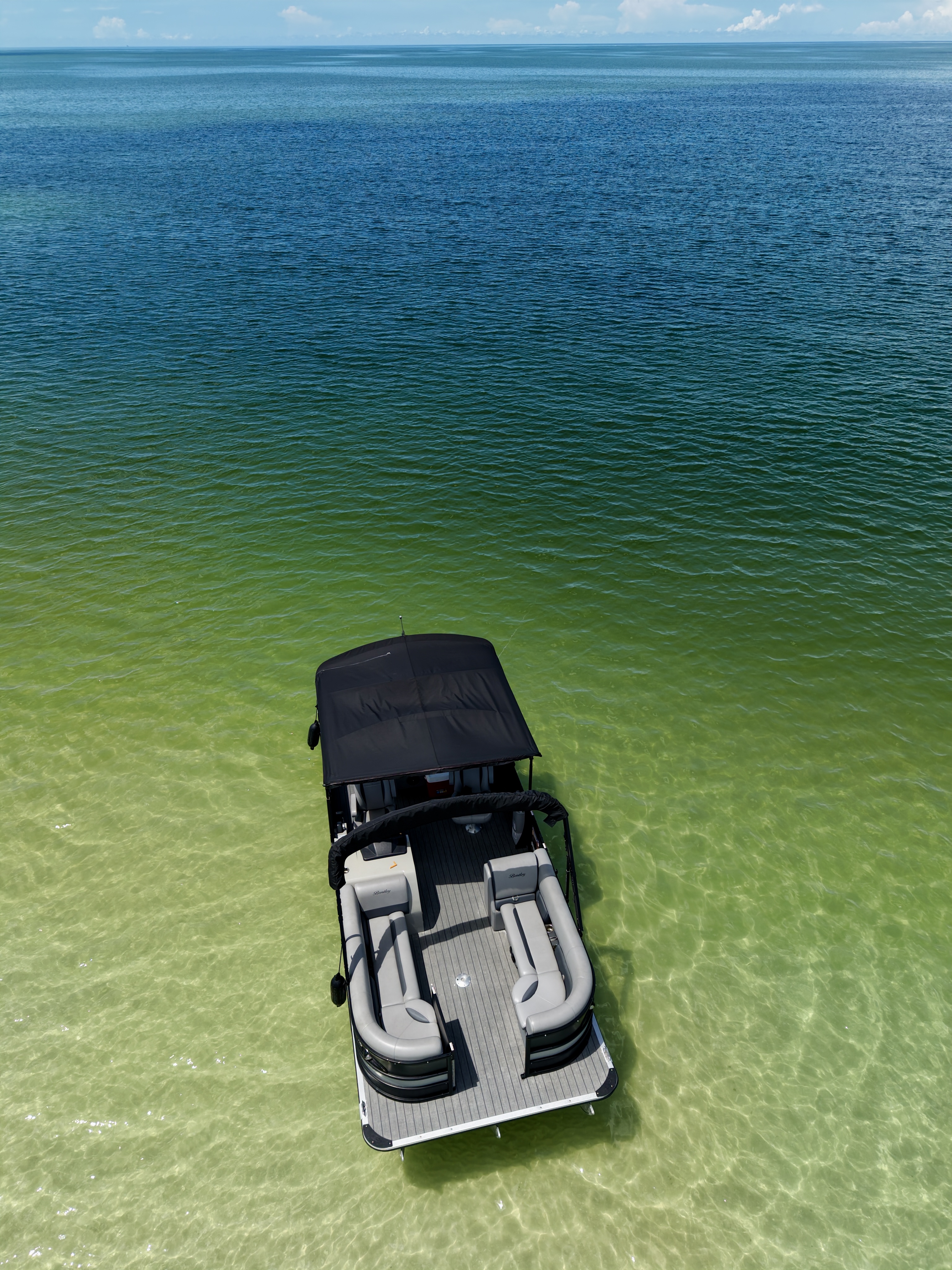 Top-down drone view of the Bentley tritoon in shallow Gulf water